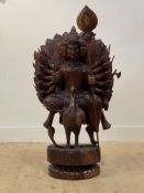 A large carved wooden figure of Kartikeya (the Hindu God of War), 20th century, Sri Lanka,