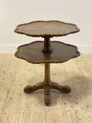 Sir Robert Lorimer KBE (Scottish. 1864-1929) An Arts and Crafts period oak two tier side table,