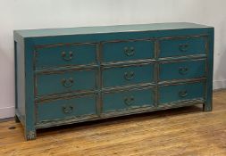 A multi-drawer hardwood sideboard in the Chinese style, late 20th century, fitted with nine drawers,