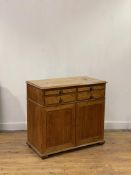 A George III satin birch writing cabinet, early 19th century, the top with moulded edge above a pull