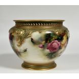 A Royal Worcester porcelain jardiniere, painted with roses and highlighted with gilding, signed by