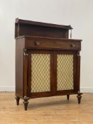 A Regency mahogany chiffonier, the raised open shelf back with gallery on turned brass supports,