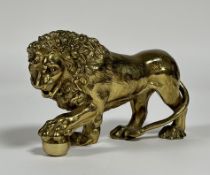 A cast brass model of the Medici Lion, late 19th century, in characteristic pose. Length 24cm