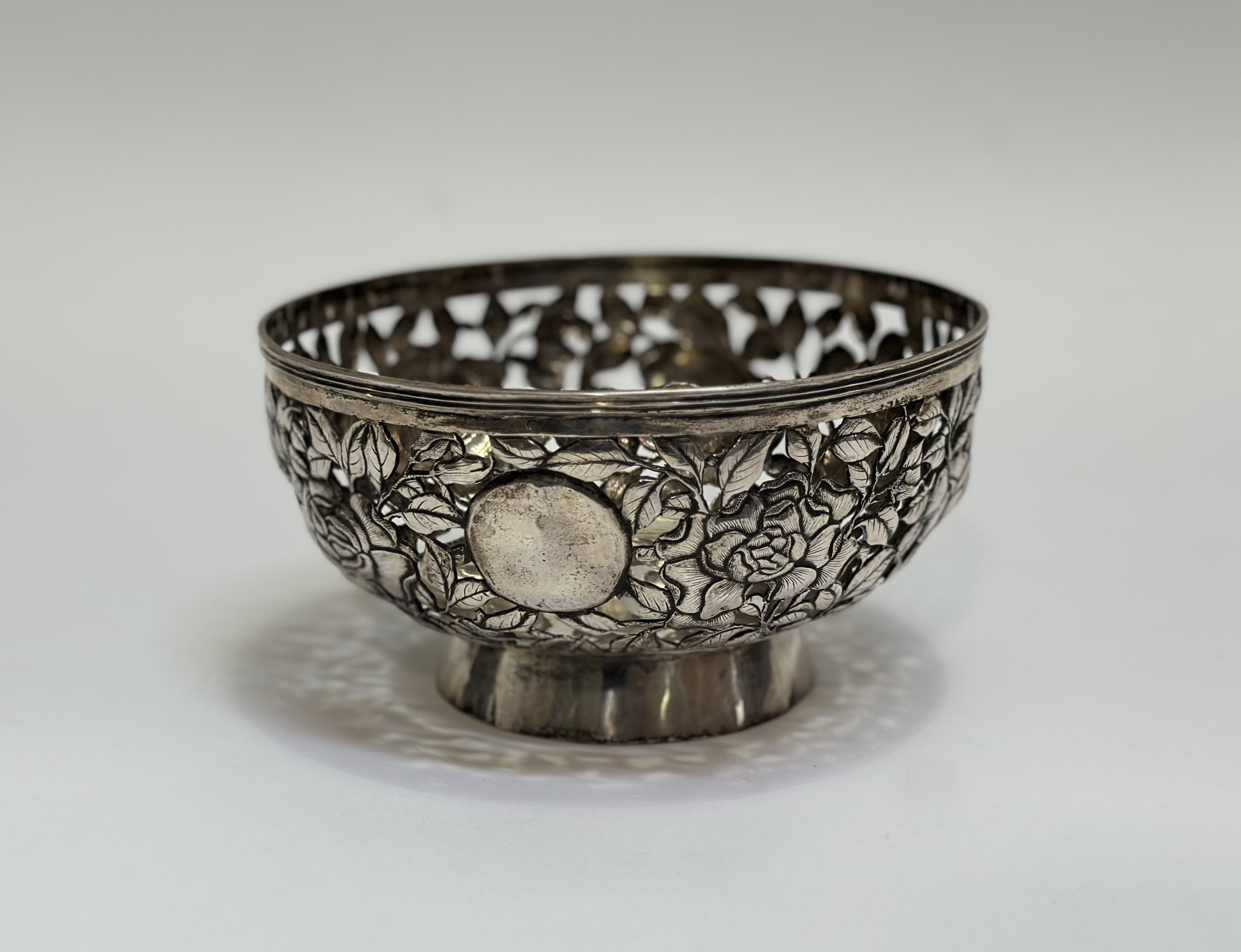 A Chinese Export silver bowl, c. 1900, in the manner of Wang Hing, pierced and chased with roses and - Image 2 of 3