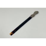 An Edwardian silver-mounted tortoiseshell page turner, the silver handle hallmarked for Deakin &