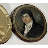 English School, early 19th century, a portrait miniature of a young man in a white stock, oval,