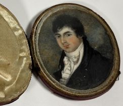 English School, early 19th century, a portrait miniature of a young man in a white stock, oval,