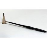 A silver candle snuffer, A.J. Poole, Birmingham 1997, of conical form with flame finial on an