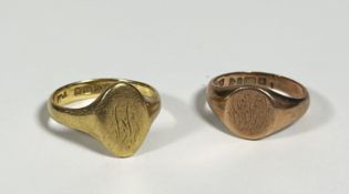 An 18ct gold signet ring, the oval plaque engraved with a monogram; together with a 9ct gold