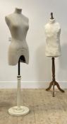 A reproduction rise and fall female torso dress makers dummy style mannequin, together with
