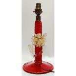 An Italian/Murano blown glass lamp base, the foot and stem in red with twisted shape, and clear/