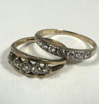 A 9ct gold ring set five graduated clear stones, J and a 9ct gold half eternity style ring set