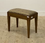 An Edwardian mahogany piano stool, the drop in seat pad upholstered in a floral embroidered