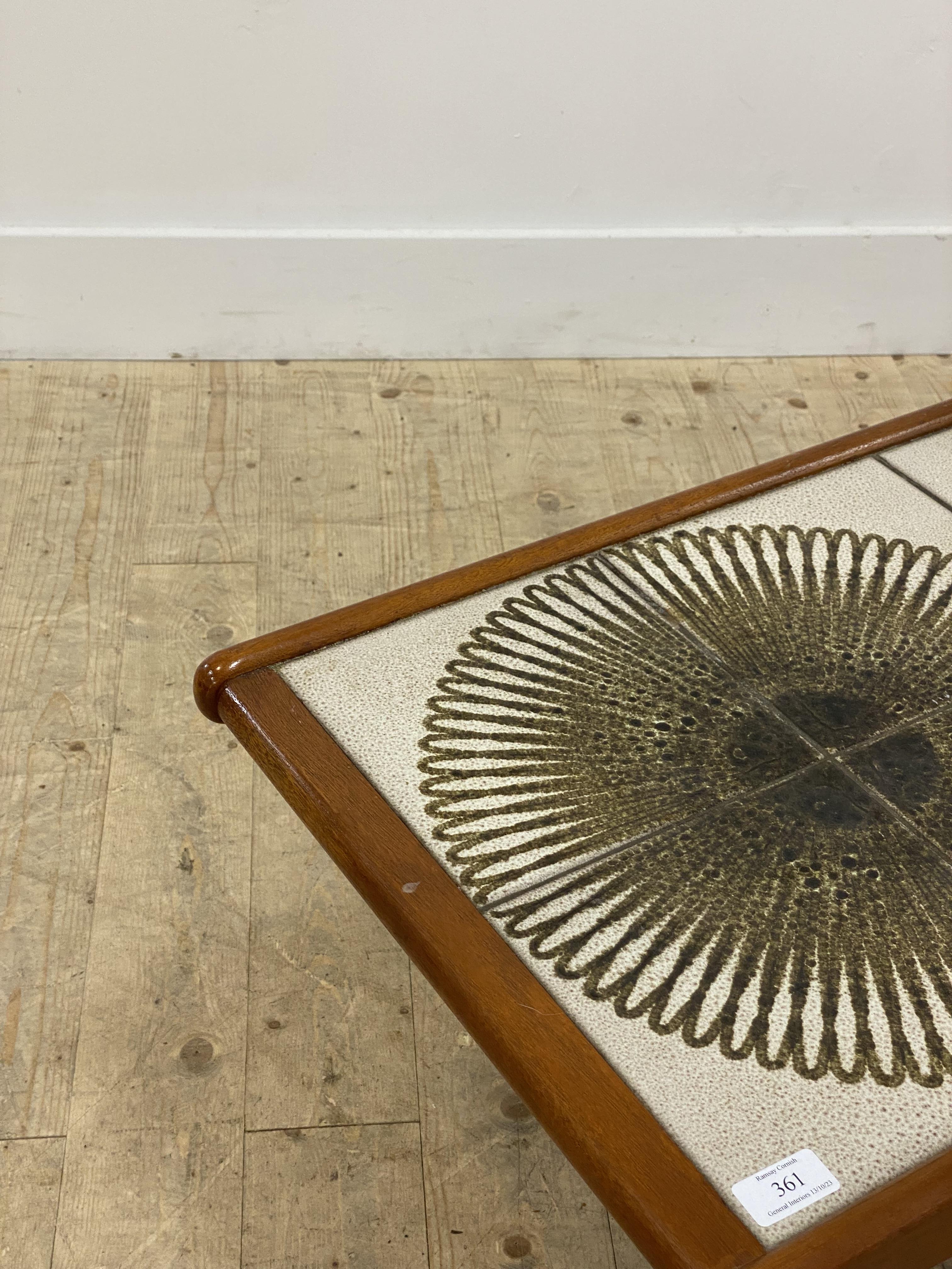 A mid century teak coffee table, the top inset with ceramic tiles depicting stylised flower head - Image 2 of 2