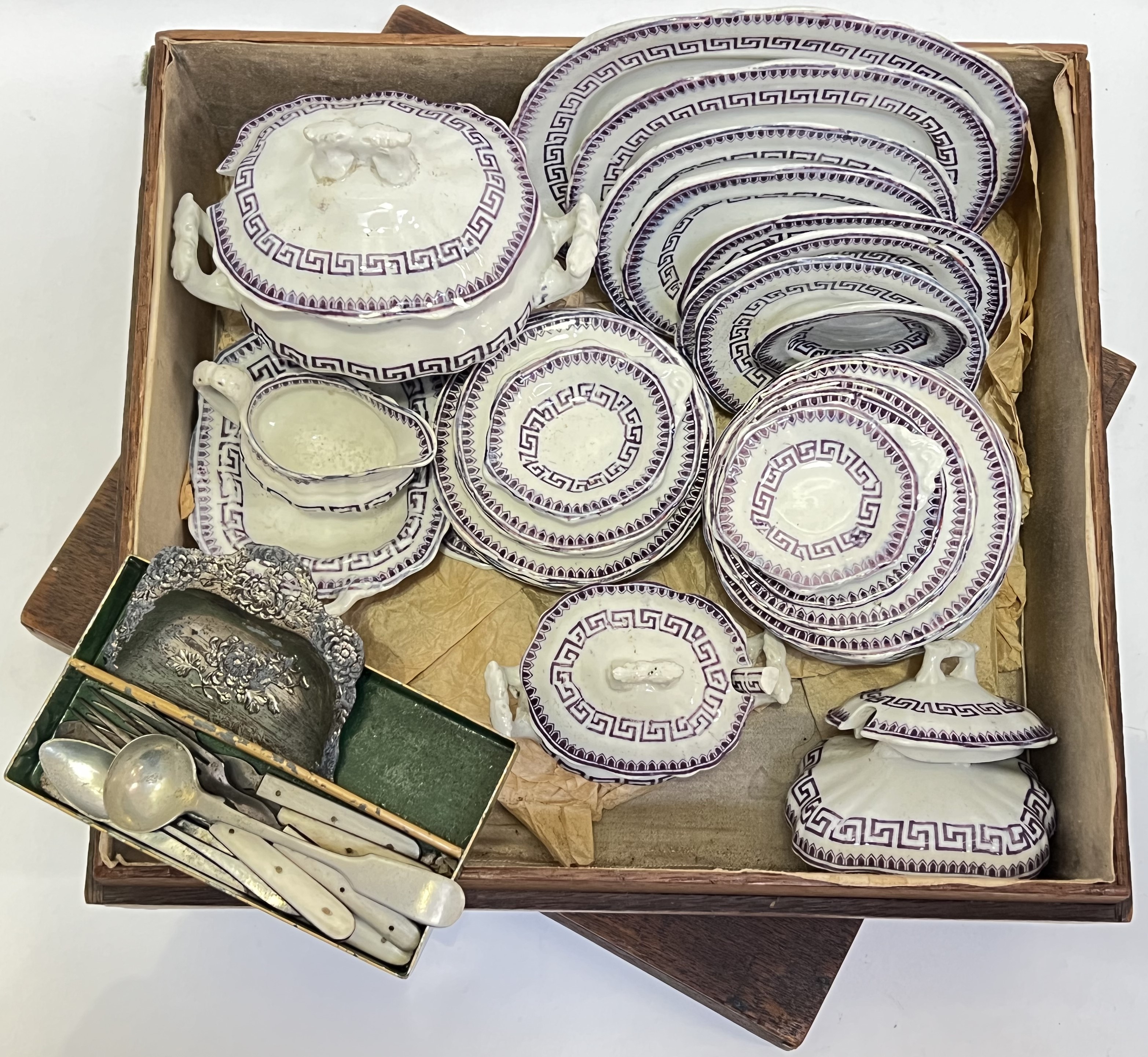 A Victorian child's dinner service with purple transfer printed Greek Key design, comprising tureens