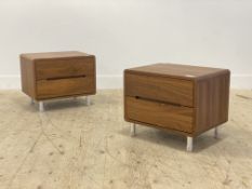 Dwell, a pair of contemporary walnut veneered bedside chests, each with two drawers raised on