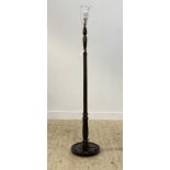 A 1930's turned and stained beech lamp standard H170cm