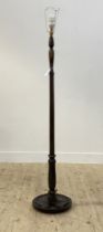 A 1930's turned and stained beech lamp standard H170cm