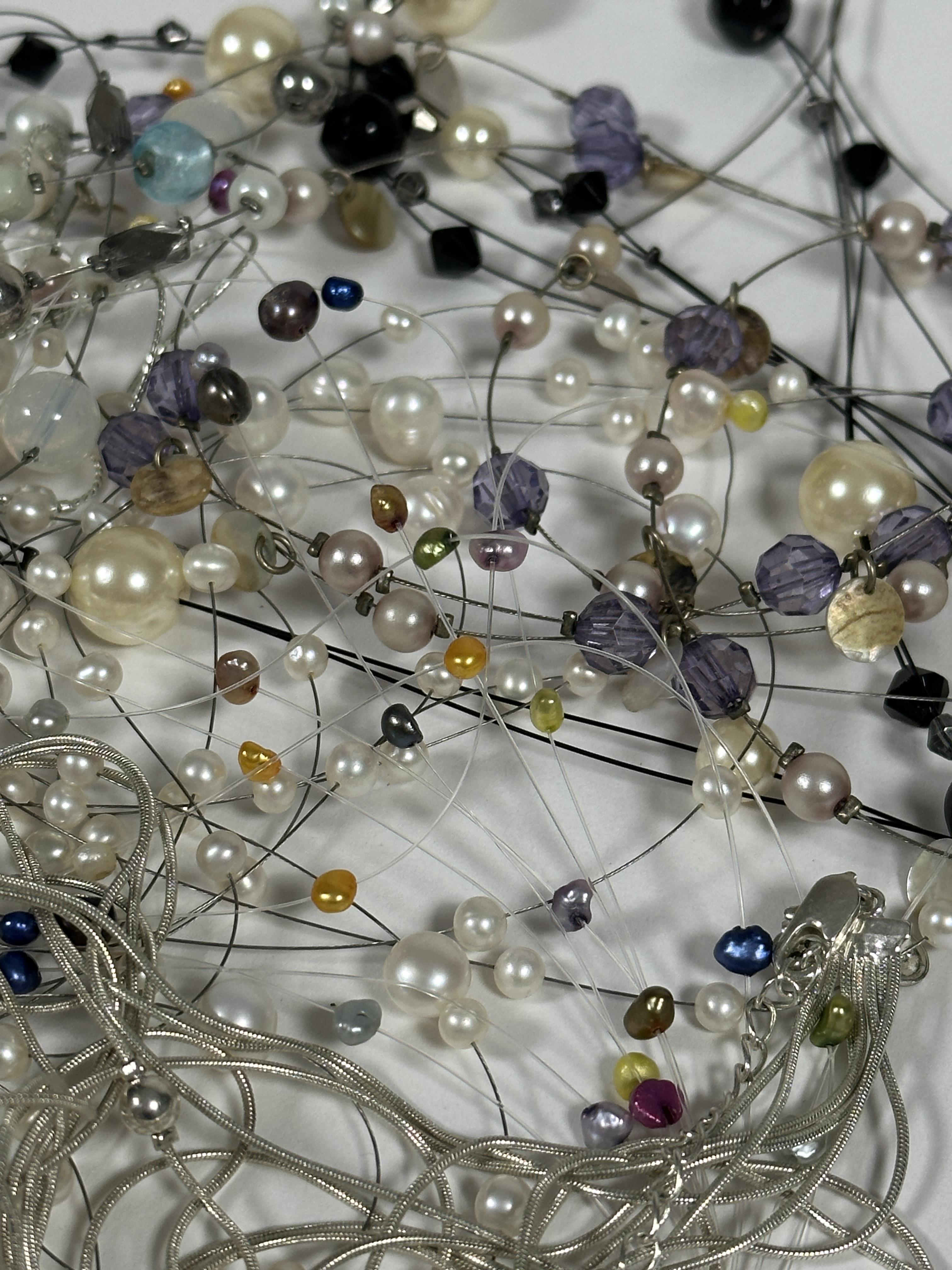 A collection of four Chinese cultured pearl multi stand necklaces, a paste pearl and French jet bead - Image 3 of 3