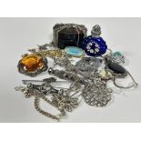 A box containing a collection of white metal and silver jewellery including a pair of paste pearl