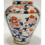 A Japanese Imari jar decorated with panels of flowers (missing lid) (h- 18cm)