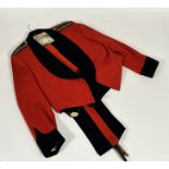 An Officer's mess dress scarlet jacket with waistcoat and trousers, wirework pips and crown "Lt.