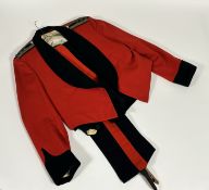 An Officer's mess dress scarlet jacket with waistcoat and trousers, wirework pips and crown "Lt.
