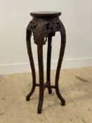 A Rosewood jardiniere stand of Chinese design, first half of the 20th century, the circular top with