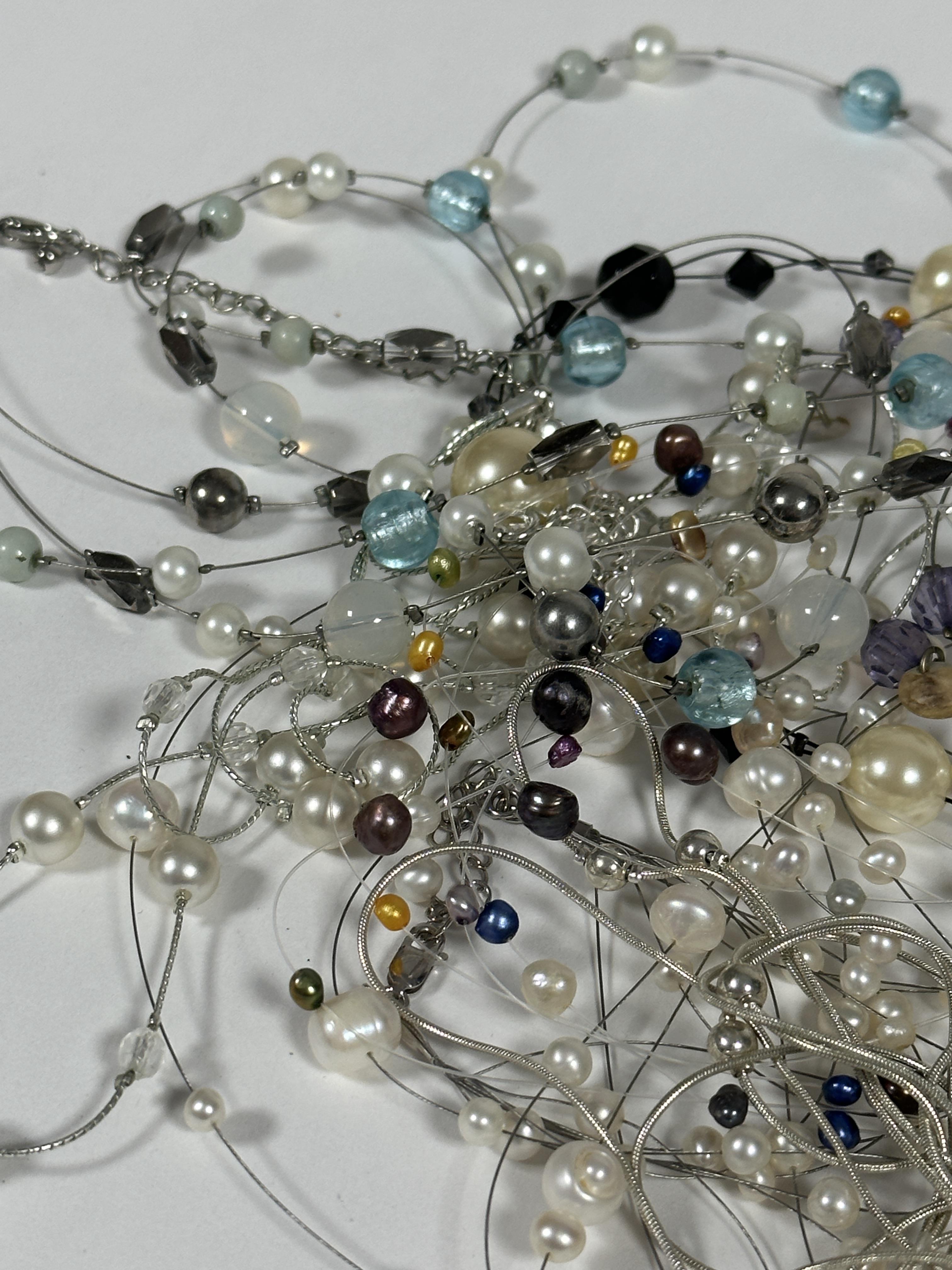 A collection of four Chinese cultured pearl multi stand necklaces, a paste pearl and French jet bead - Image 2 of 3