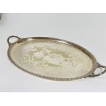 A Epns oval engraved tow handled tea tray, rubbed , ( L x 74cm x W x 45)