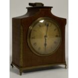 An early 20th century mahogany mantel clock, the gilt dial with Roman chapter ring inscribed Jas
