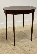An Edwardian mahogany occasional table, the oval top raised on square tapered supports H70cm, W73cm,