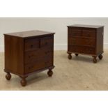 A traditional pair of cherry chests, each with a brushing slide above two short and two long