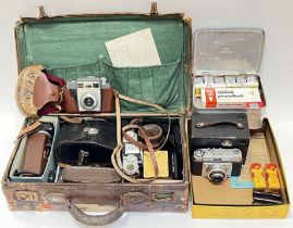 A quantity of vintage cameras/accoutrements in leather case, to include Kodak, Elixa, Ilform