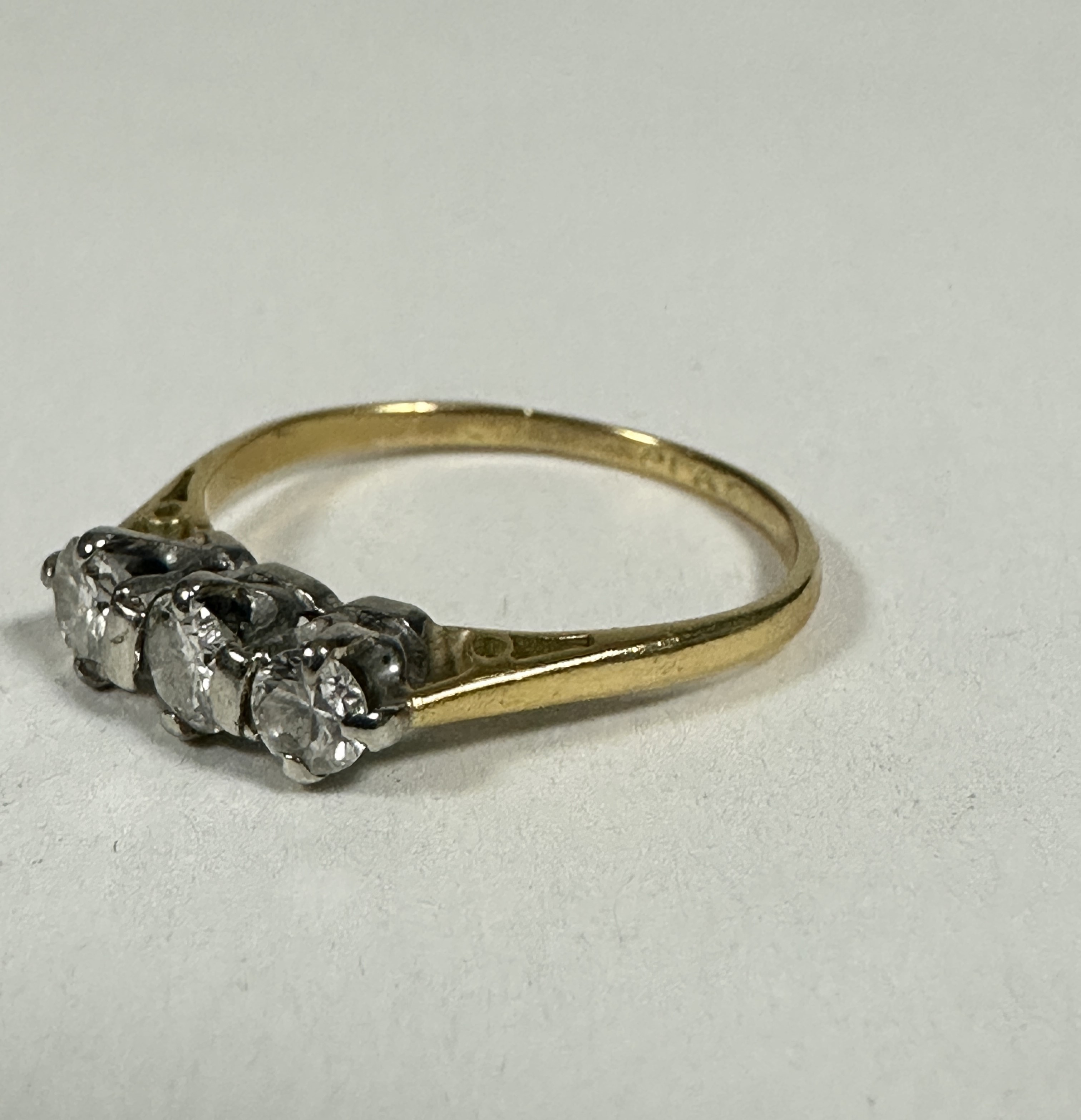 A yellow metal and platinum three stone Diamond ring, the brilliant cut stones approximately o. - Image 2 of 2