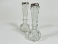 A pair of crystal Thistle shaped flower vases with London silver mounted tops, (H x 19cm)