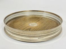A modern Douglas Pell London silver gallery tray with pierced border and oak inset base, with