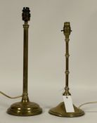 Two early to mid 20th cetury gilt brass candle stick form table lamps, H43cm