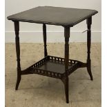 An Edwardian mahogany occasional table, the top with canted corners raised on turned supports united