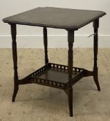 An Edwardian mahogany occasional table, the top with canted corners raised on turned supports united
