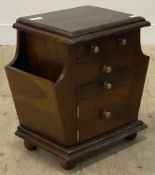 A late 20th century stained walnut chest, fitted with four drawers and a magazine rack to each end