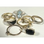 A Chilean 10ct gold dress ring set mother of pearl and onyx, M, with a matching pendant, and a group