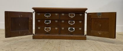 An American Amberg's Patent walnut filling chest, early 20th century, the case with two panelled