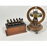 A horizontal Tangent Laboritory Galvanometer by Philip Harris & Co Birmingham, (H x 24cm) and a W.