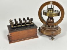 A horizontal Tangent Laboritory Galvanometer by Philip Harris & Co Birmingham, (H x 24cm) and a W.