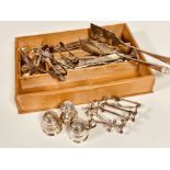 A collection of Epns including, serving tongs, three piece condiment set, four knife rests, bean