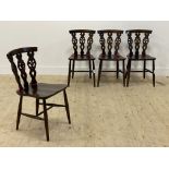 Ercol, a set of four vintage stained elm and beech dining chairs H80cm