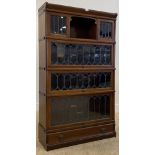 Globe Wernicke, an early 20th century mahogany stacking library bookcase, with drawer to base (