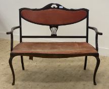 An Edwardian stained beech framed canape, with upholstered back and seat, raised on cabriole