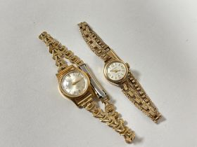 A 18ct gold Lady's Nissim wrist watch on gilt metal bracelet, 13.6g, not working and a 9ct gold